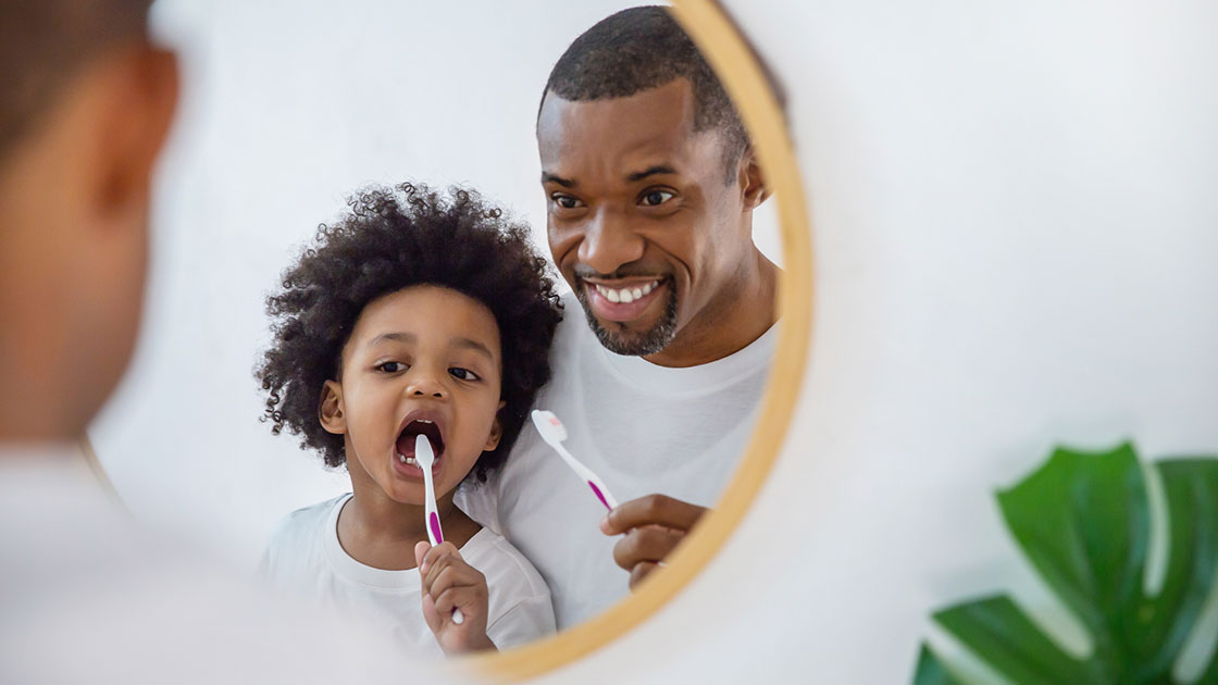 Parent and Child Brushing Teeth